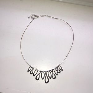 A silver beaded necklace